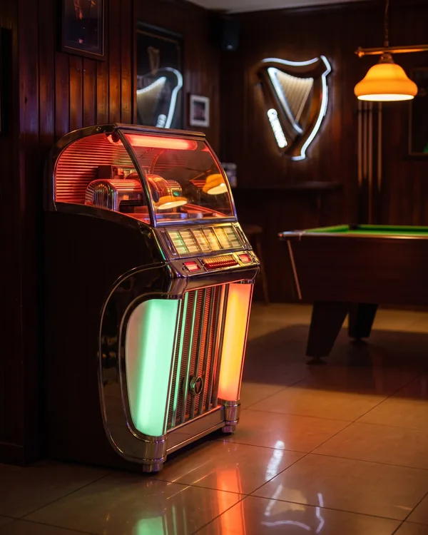 Illustration of a retro jukebox glowing under red neon