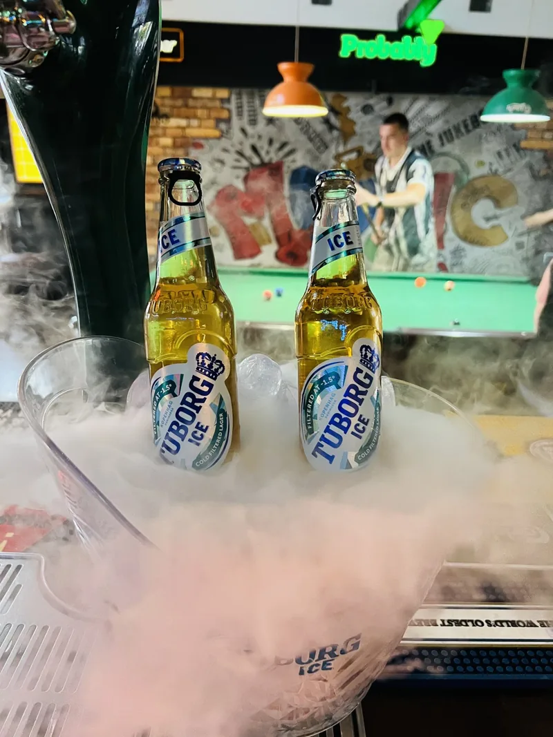 Tuborg on ice over the pool table